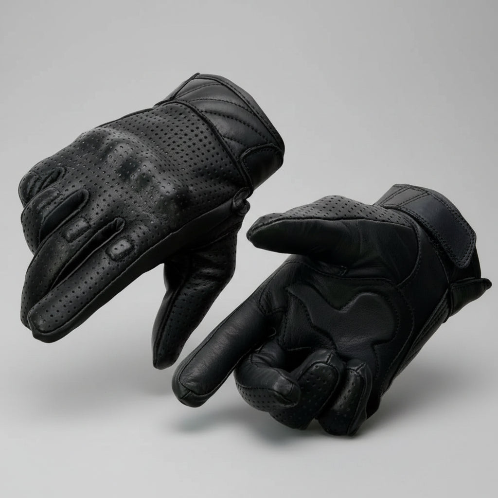 Black leather gloves with palm padding and knuckle protection on a white background