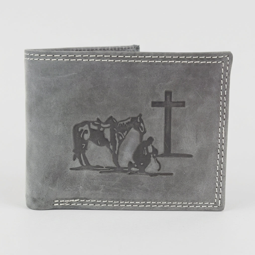 A gray leather bi-fold wallet featuring an embossed design of a cowboy with a horse and a cross on a white background.