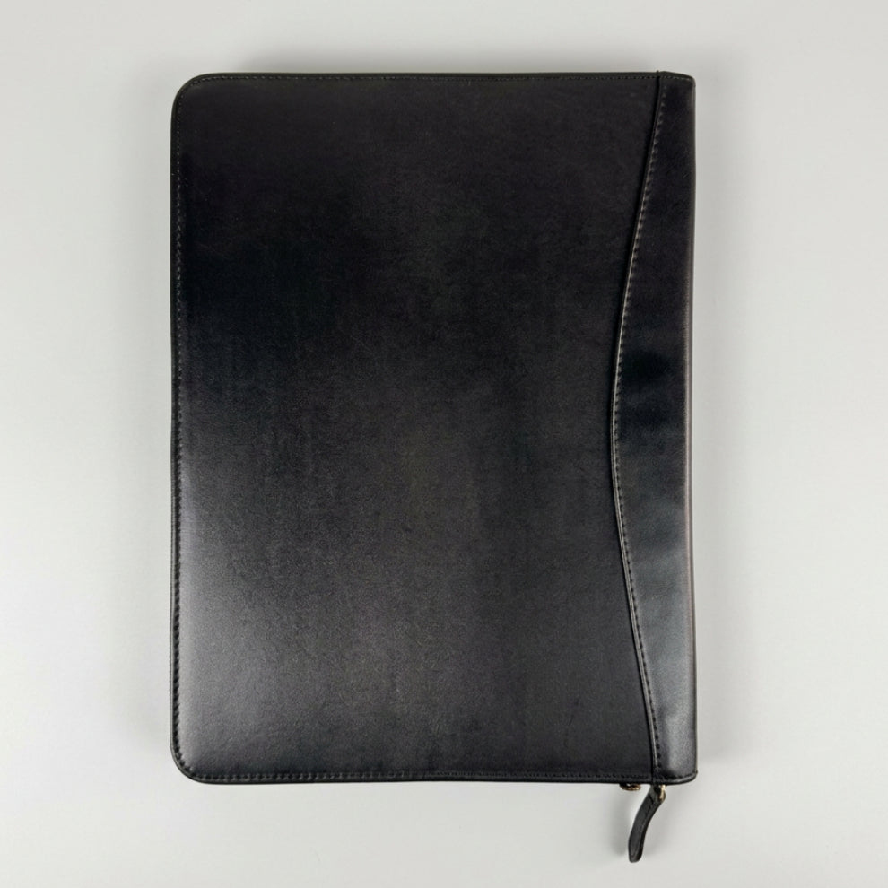A black leather zippered document pouch or notebook cover