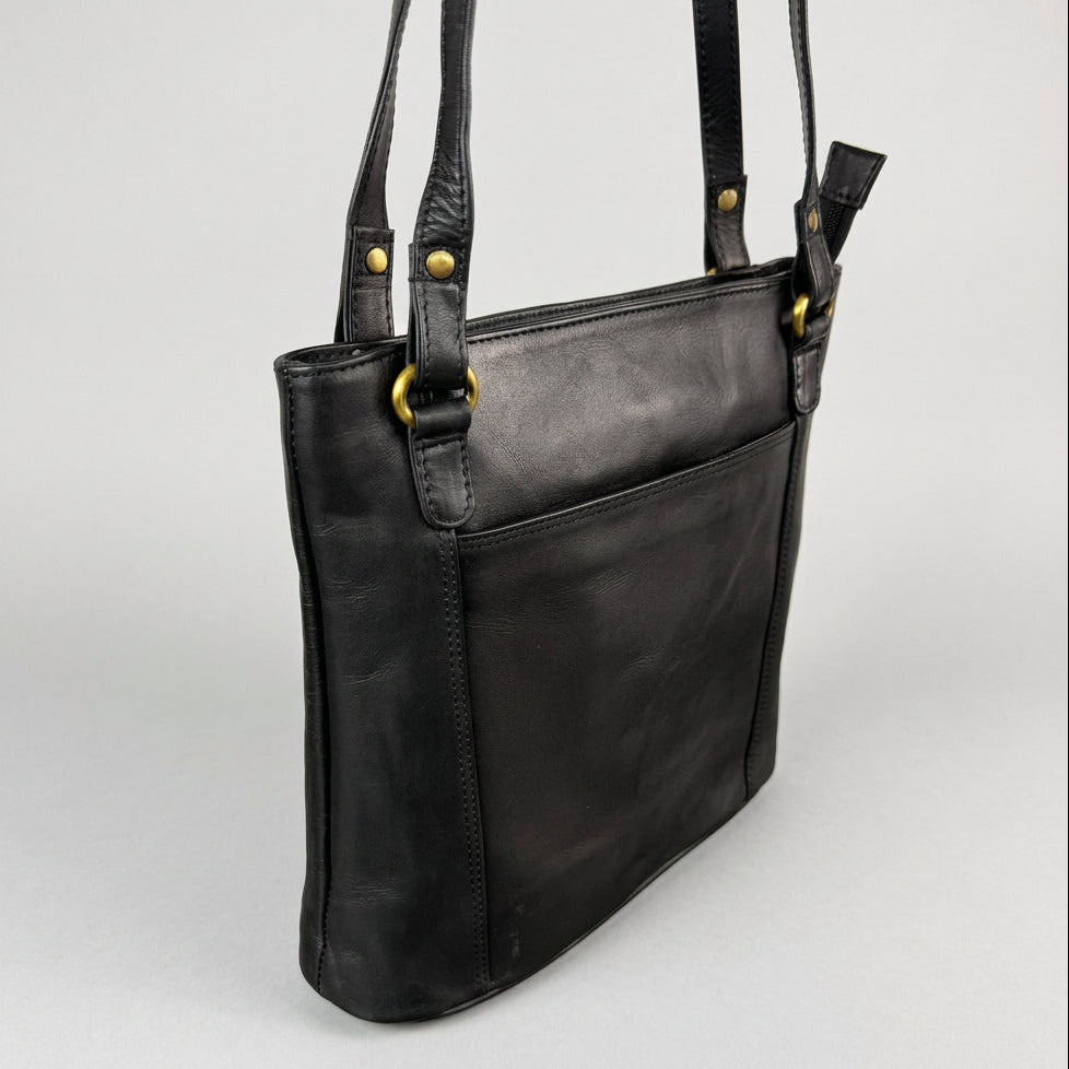 A black leather shoulder bag with gold-tone hardware