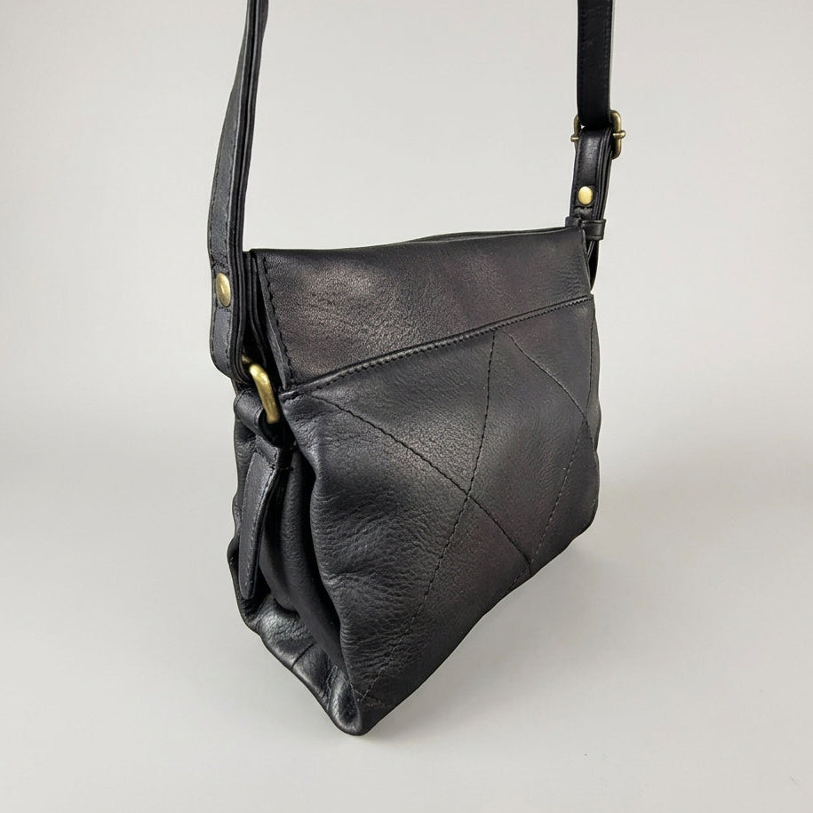 Black leather shoulder bag with gold-tone hardware