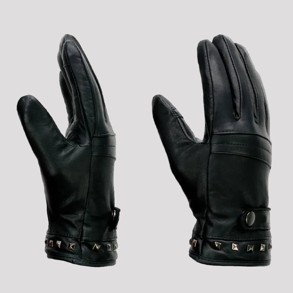 A pair of black leather gloves shown from the back, featuring studded wristbands and a snap button closure. The image includes promotional text overlays at the top ('iTOUCH', 'THERMAL LINED', 'PADDED') and a faint watermark in the background.