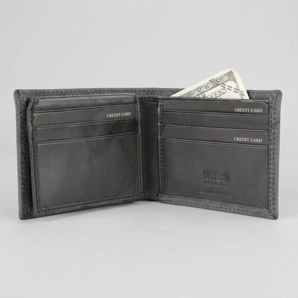 A dark gray leather bi-fold wallet shown open, displaying multiple card slots, an interior pocket, and a dollar bill tucked into the right side. The brand name 'REDD' is embossed on the lower right panel.