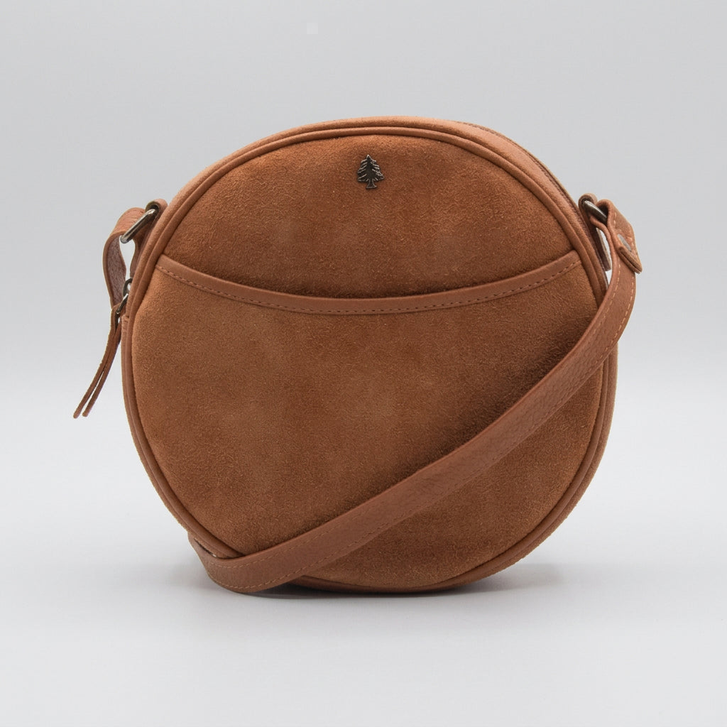 A brown suede crescent-shaped crossbody bag with a matching adjustable shoulder strap, shown on a plain white background.