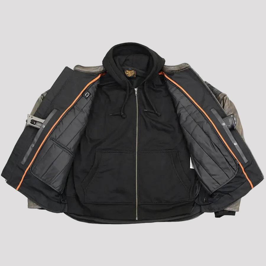 A black zip-up hooded jacket laid flat against a white background, with a gray quilted vest layered over the shoulders and sleeves. The jacket features orange piping along the inner sleeve edges and a gold-toned logo patch on the chest.