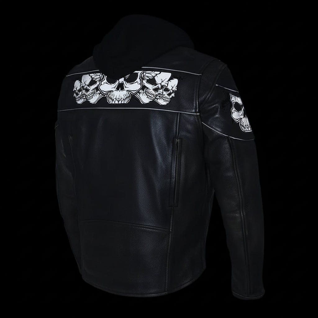 Black leather jacket with skull designs on the back against a black background