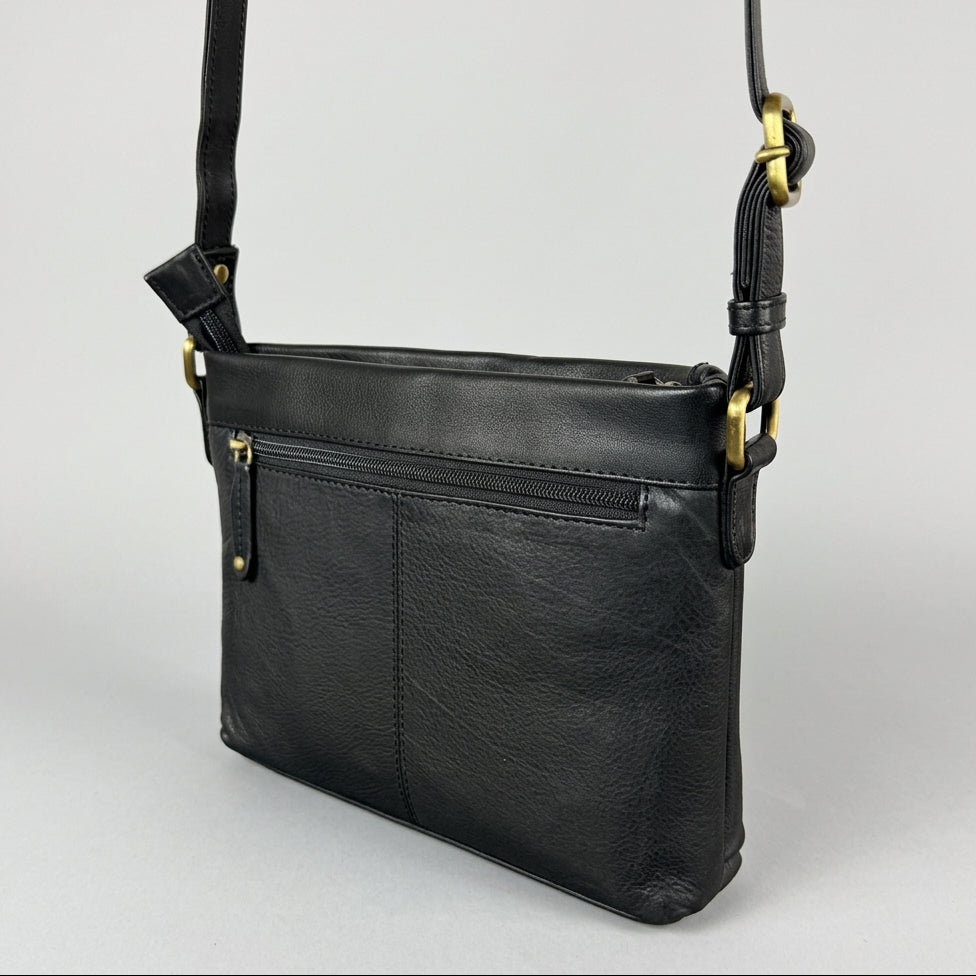 A black leather crossbody bag with gold-tone hardware