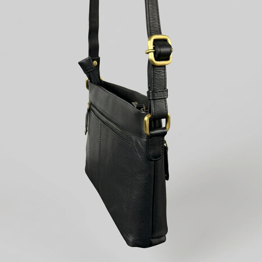 A black leather crossbody bag with gold-tone hardware