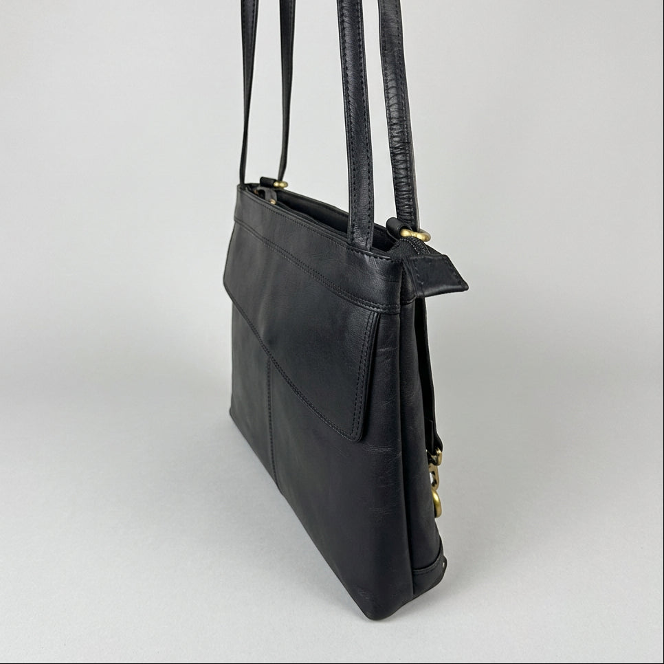 A black leather shoulder bag with a structured rectangular shape